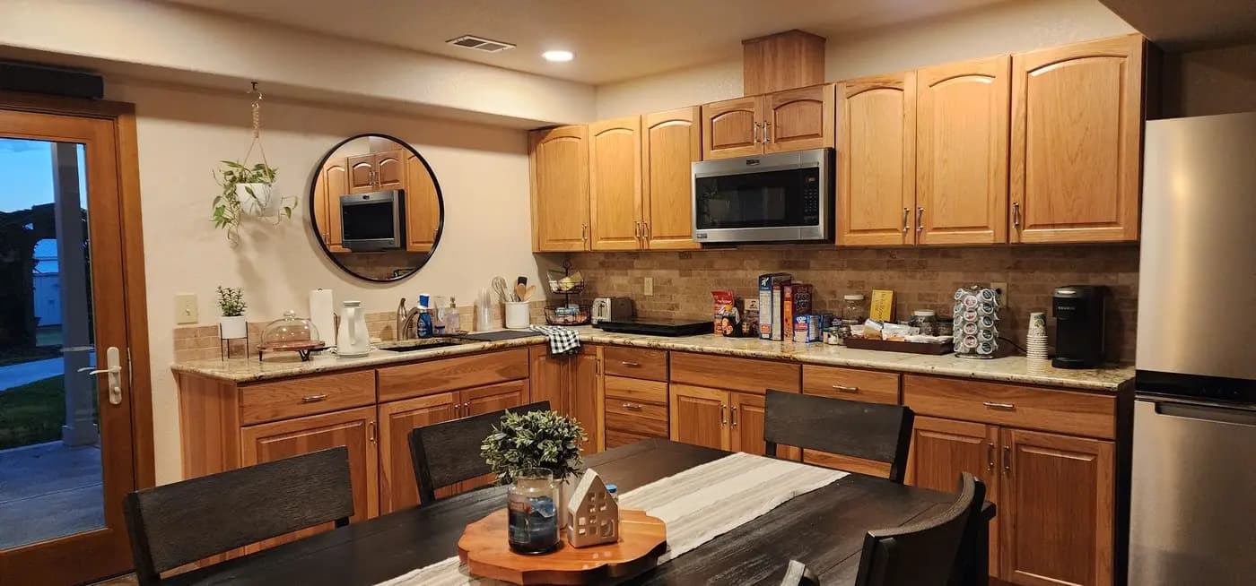 Kitchen with wood cabinetry and granite countertops